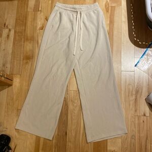 Light tan cream wide leg baggy sweatpants adjustable waist low or high rise.